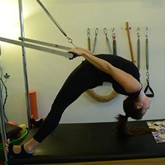 Cadillac con barra extensible para el ejercicio de brazos